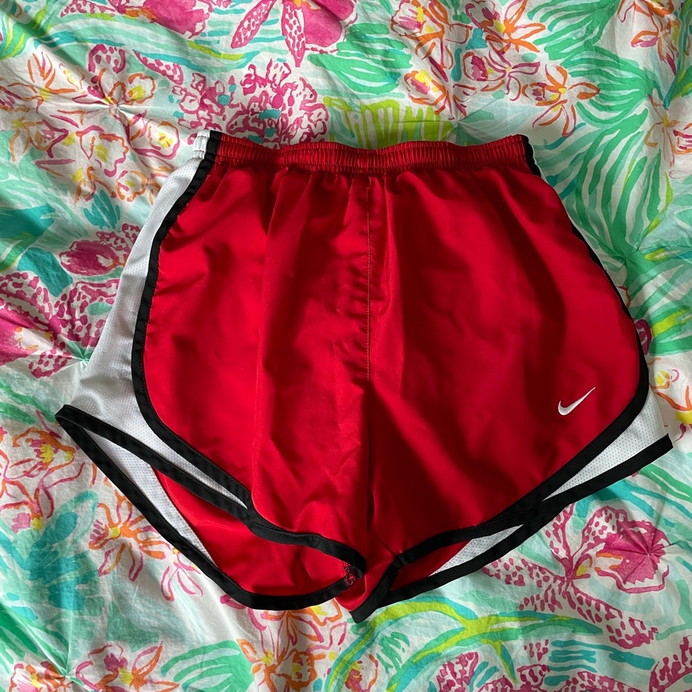 Red Nike running shorts